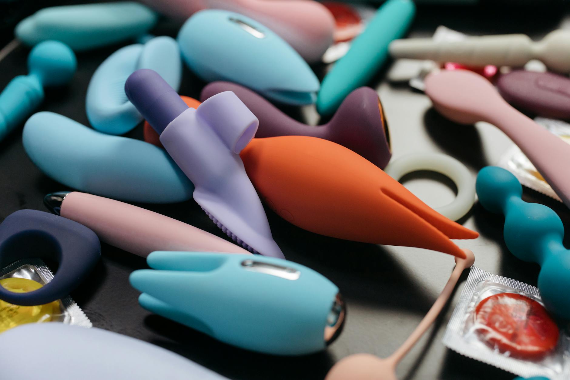 Woman contemplating intimacy and connection with a clitoral vibrator